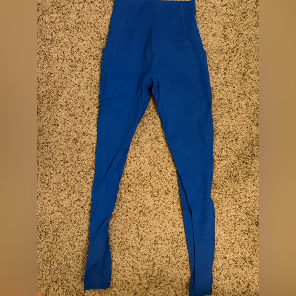 ALPHALETE: Blue workout leggings. Size either S or XS. No tags.